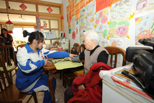 海淀西三旗街道雷锋进社区(图)